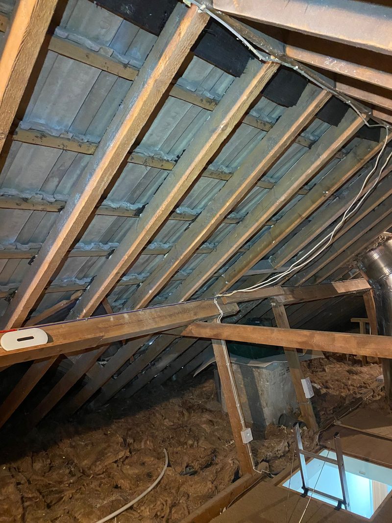 Mineral wool at joist level under the rafters